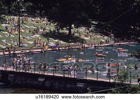 Stock Image - people enjoying a hot summer day. Fotosearch