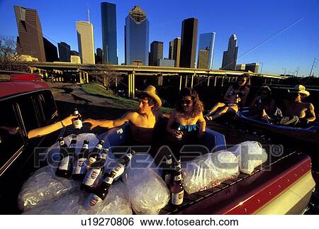 riding in the bed of a truck in front of the Houston skyline View Large Photo Image Stock Photograph - riding in the bed of a truck in front of the Houston skyline. Fotosearch