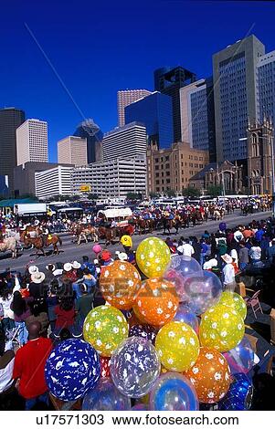 Stock Image - trail ride through downtown Houston to the rodeo. Fotosearch