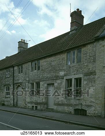 Stock Image - 18th century stone house in country village. Fotosearch