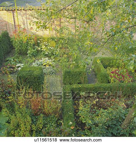 Aerial view of garden in Autumn with clipped hedges View Large Photo Image Stock Photo - Aerial view of garden in Autumn with clipped hedges. Fotosearch