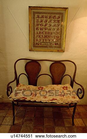 Stock Image - Antique sofa in traditional living room. Fotosearch