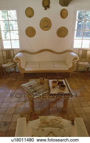 Stock Image - Antique sofa in traditional living room. Fotosearch