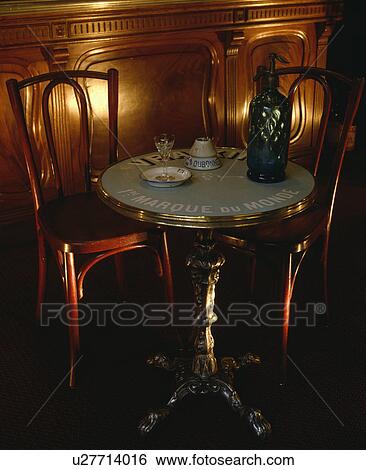 Bentwood Chairs And French Cafe Table Stock Photograph U27714016 Fotosearch