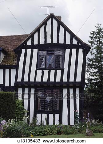 Black and white timbered country housem with lattice windows View Large Photo Image Stock Image - Black and white timbered country housem with lattice windows. Fotosearch