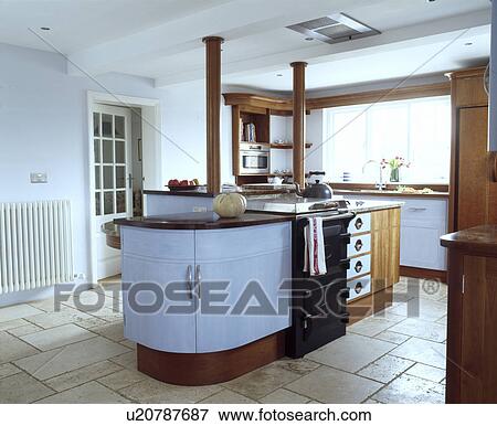 Picture Of Black Oven In Island Unit Modern White Kitchen With Black Oven In Island Unit Modern White Kitchen With Travertine Floor Tiles