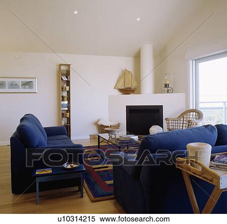 Blue sofas in modern white living room View Large Photo Image Stock Photography - Blue sofas in modern white living room. Fotosearch