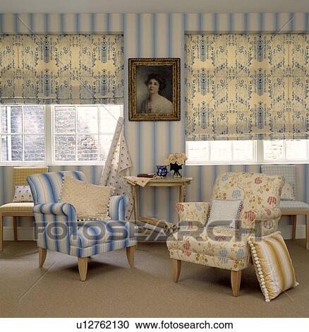 Blue+white patterned blinds and stiped armchair in living room with blue+white striped wallpaper View Large Photo Image Stock Image - Blue+white patterned blinds and stiped armchair in living room with blue+white striped wallpaper. Fotosearch