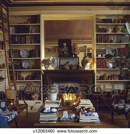 Bookshelves in traditional living room View Large Photo Image Stock Image - Bookshelves in traditional living room. Fotosearch