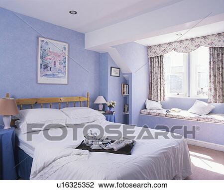 Stock Image - Breakfast Tray on Bed.. Fotosearch