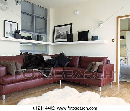 Brown leather corner sofa in modern living room View Large Photo Image Stock Image - Brown leather corner sofa in modern living room. Fotosearch