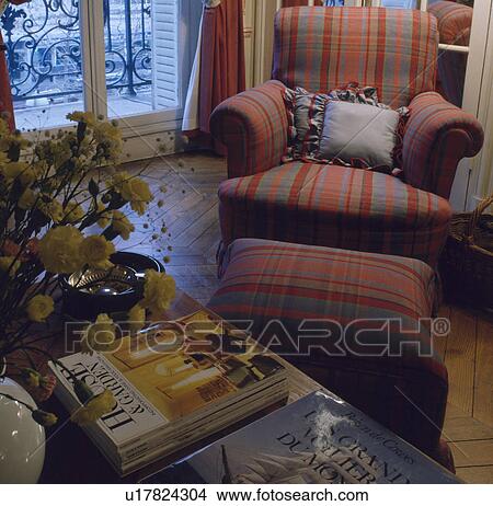 Picture - Checked red armchair in traditional living room. Fotosearch