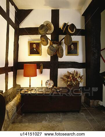 Stock Photo - chest, interior, beams, hats, antlers, freestanding, interiors. Fotosearch