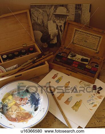 Stock Image - Close-up of artists paintboxes and brushes. Fotosearch