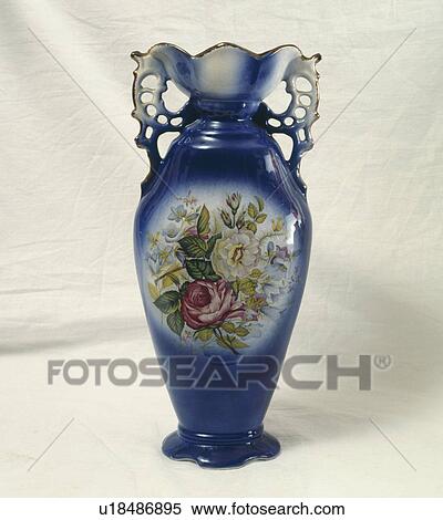 Stock Photography - Close up of blue china vase with rose pattern. Fotosearch