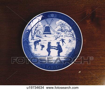Picture - Close up of blue & white plate with Dutch skating scene. Fotosearch