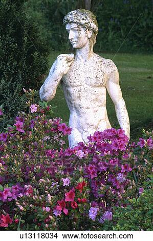Picture - Close-up of classical statues in the garden. Fotosearch