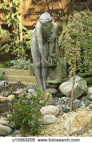 Close-up of classical statues in the garden View Large Photo Image Stock Photo - Close-up of classical statues in the garden. Fotosearch