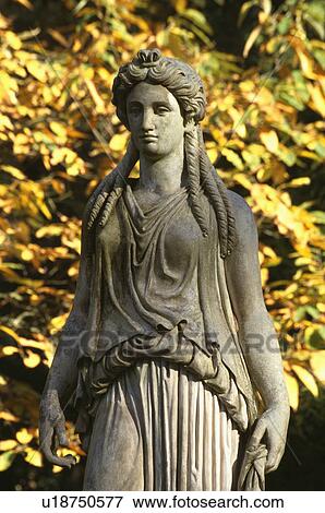 Stock Photo - Close-up of classical statues in the garden. Fotosearch