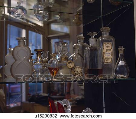 Close-up of collection of old French perfume bottles View Large Photo Image Stock Image - Close-up of collection of old French perfume bottles. Fotosearch