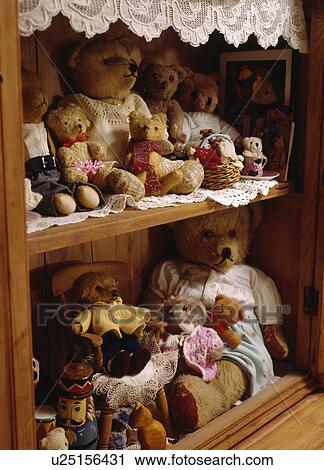 Close-up of collection of teddybears on old pine shelves View Large Photo Image Stock Image - Close-up of collection of teddybears on old pine shelves. Fotosearch