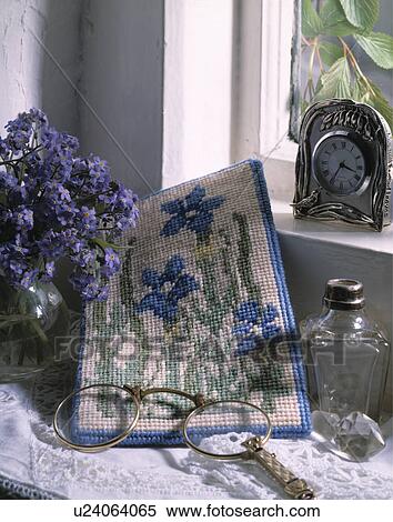 Stock Photography - Close-up of cross-stitch spectacle case. Fotosearch