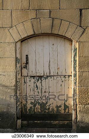 Stock Photo - Close up of dilapidated stable door. Fotosearch
