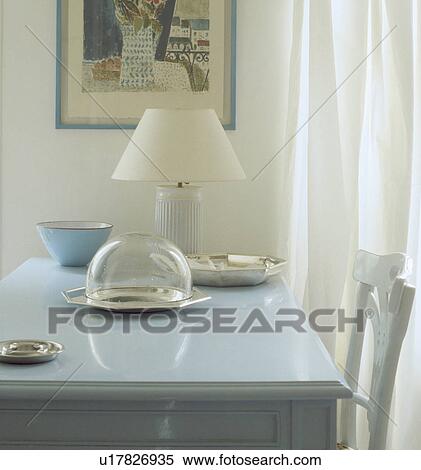 Close-up of glass dome and white lamp on pastel blue table View Large Photo Image Stock Photography - Close-up of glass dome and white lamp on pastel blue table. Fotosearch