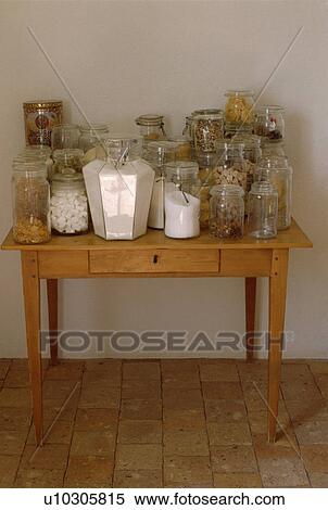 Close-up of glass storage jars on pine table View Large Photo Image Stock Photography - Close-up of glass storage jars on pine table. Fotosearch