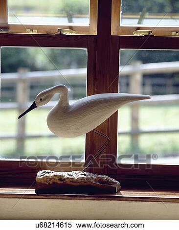 Close-up of hand-carved wooden bird View Large Photo Image Stock Photography - Close-up of hand-carved wooden bird. Fotosearch