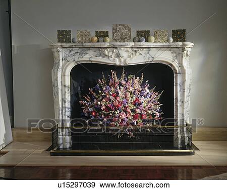 Stock Photo - Close-up of marble flowers with dried flower arrangement. Fotosearch