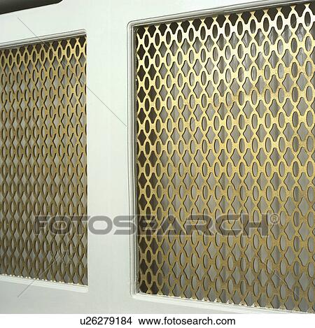 Picture - Close-up of metal radiator cover. Fotosearch