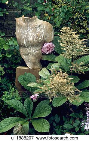 Stock Photo - Close-up of modern sculpture in the garden. Fotosearch