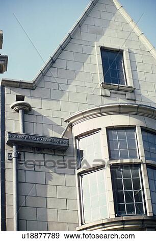 Stock Photo - Close up of oriel window and Georgian drainpipes . Fotosearch