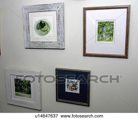 Close-up of pictures on wall View Large Photo Image Stock Photo - Close-up of pictures on wall. Fotosearch