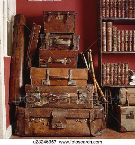 Close-up of pile of old leather suitcases View Large Photo Image Stock Photo - Close-up of pile of old leather suitcases. Fotosearch