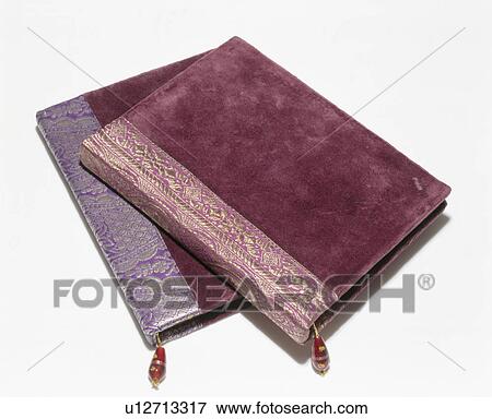 Close-up of purple velvet notebooks edged with antique sari fabric View Large Photo Image Stock Photo - Close-up of purple velvet notebooks edged with antique sari fabric . Fotosearch