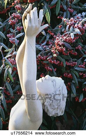 Close-up of sculpture in country garden in winter View Large Photo Image Picture - Close-up of sculpture in country garden in winter. Fotosearch