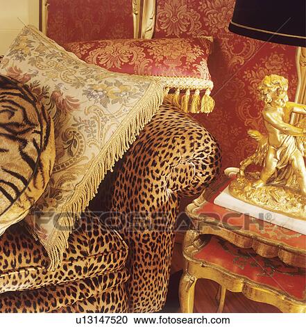 Close-up of silk cushions on animalprint sofa View Large Photo Image Stock Image - Close-up of silk cushions on animalprint sofa. Fotosearch