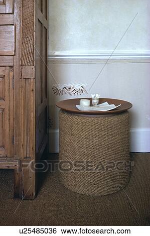 Close-up of sisal-covered cylindrical table View Large Photo Image Stock Photograph - Close-up of sisal-covered cylindrical table. Fotosearch