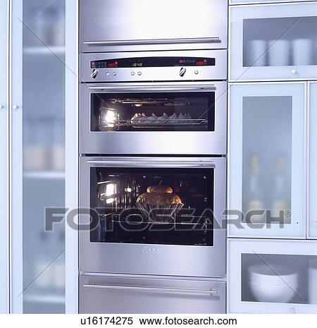 Stock Photography - Close-up of stainless steel double oven. Fotosearch