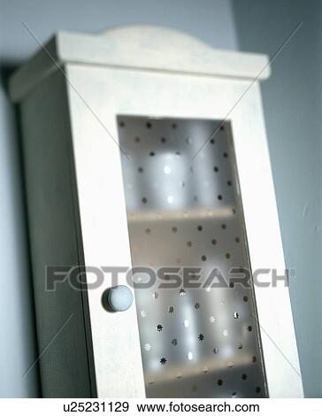 Closeup of bathroom cupboard with glazed door View Large Photo Image Stock Photo - Closeup of bathroom cupboard with glazed door. Fotosearch