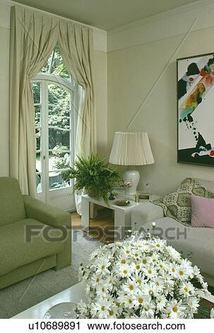 Cream curtains in traditional living room View Large Photo Image Stock Image - Cream curtains in traditional living room. Fotosearch
