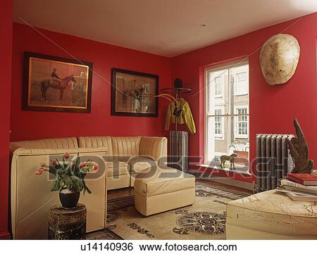 Stock Images Of Cream Leather Sofas In Modern Red Living Room Cream Leather Sofas In Modern Red Living Room
