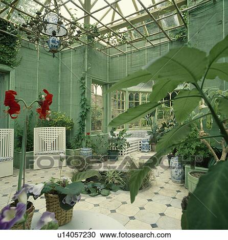 Stock Image - Custom designed green conservatory.. Fotosearch