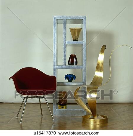 Stock Image - Designer chairs in showroom.. Fotosearch