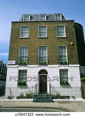 Stock Image - Detached Victorian townhouse in North London. Fotosearch
