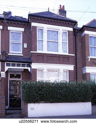 Stock Image - exterior of edwardian semi-detatched house in London. Fotosearch