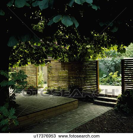 Fence in green country garden in summer View Large Photo Image Stock Image - Fence in green country garden in summer. Fotosearch