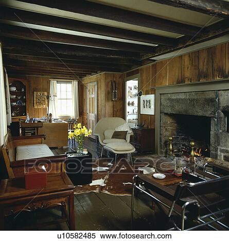 Fireplace in traditional country living room View Large Photo Image Stock Photography - Fireplace in traditional country living room. Fotosearch